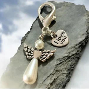 Angel charm with "I love you" heart.