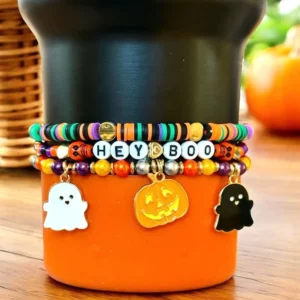 Halloween bracelets with ghost and pumpkin charms.