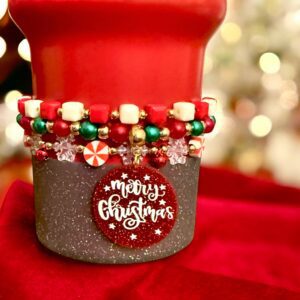 Festive Christmas bracelet with red, green, and white beads.
