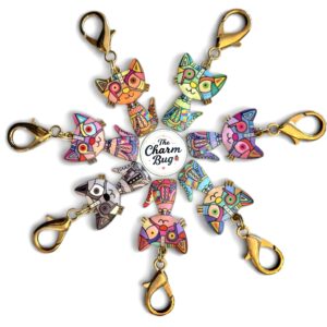Colorful owl keychains arranged in a circle with clips.